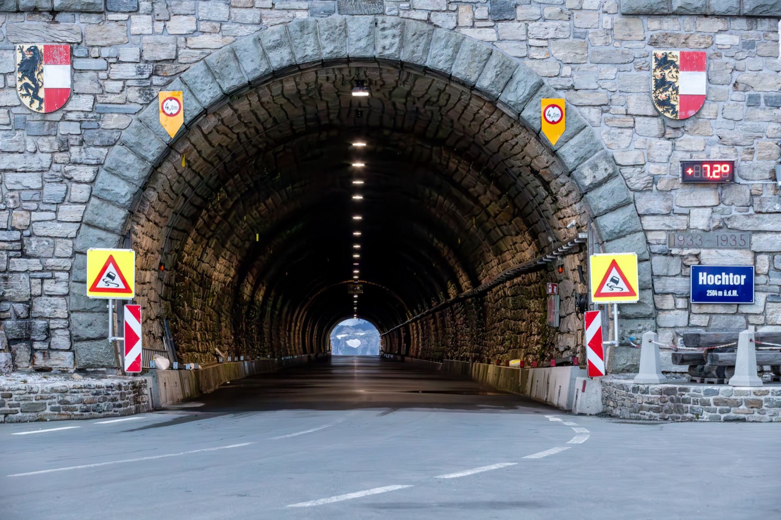 The stone tunnel portal at Hochtor on the Grossglockner road, coats of arms set above the arch