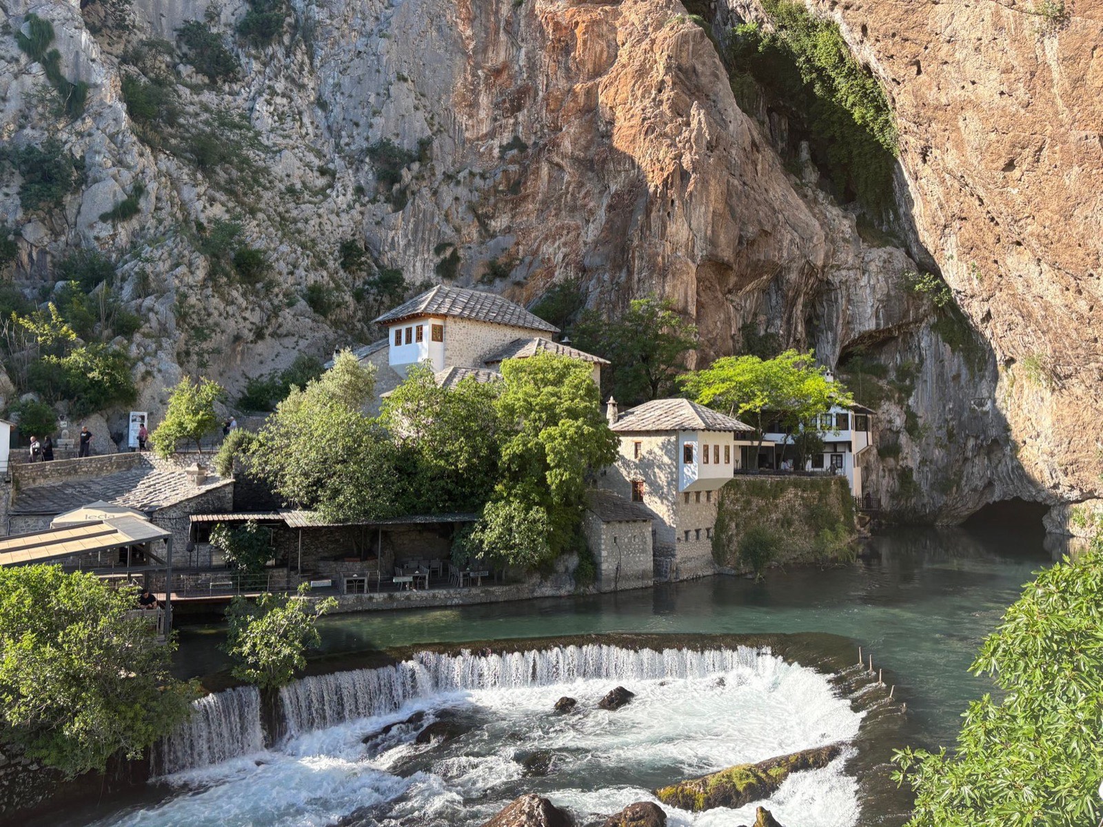 The Blagaj dervish house at the foot of a cliff where the Buna river emerges