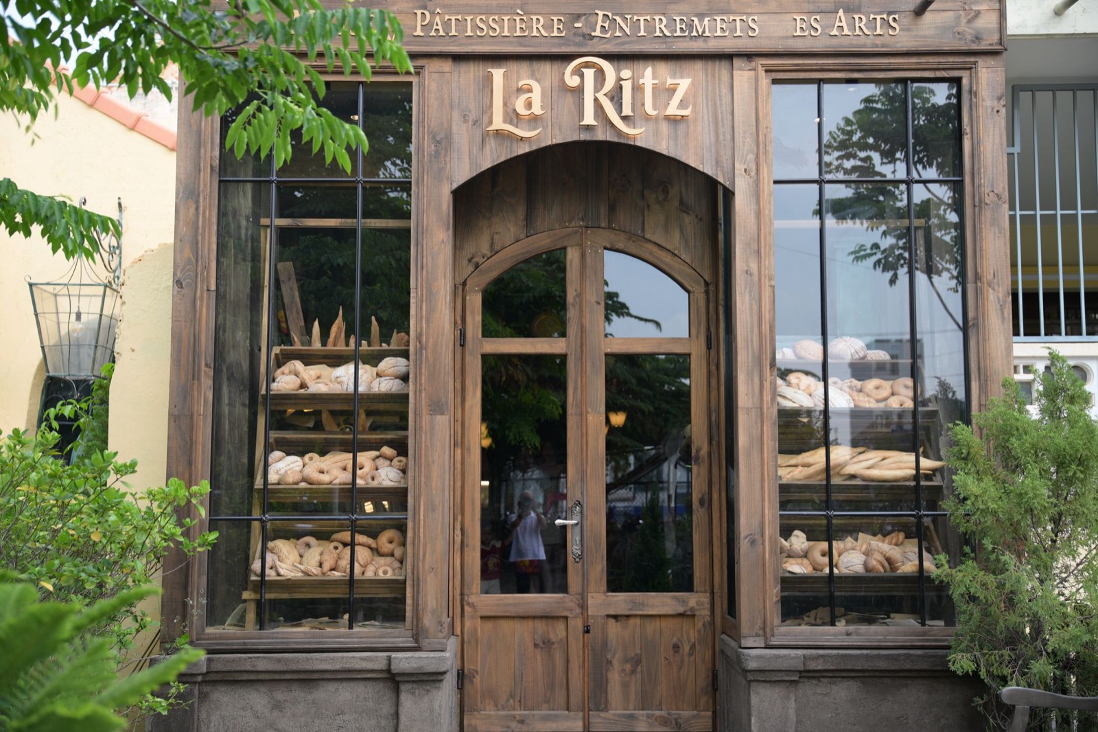 Baguettes and round loaves in a French bakery window