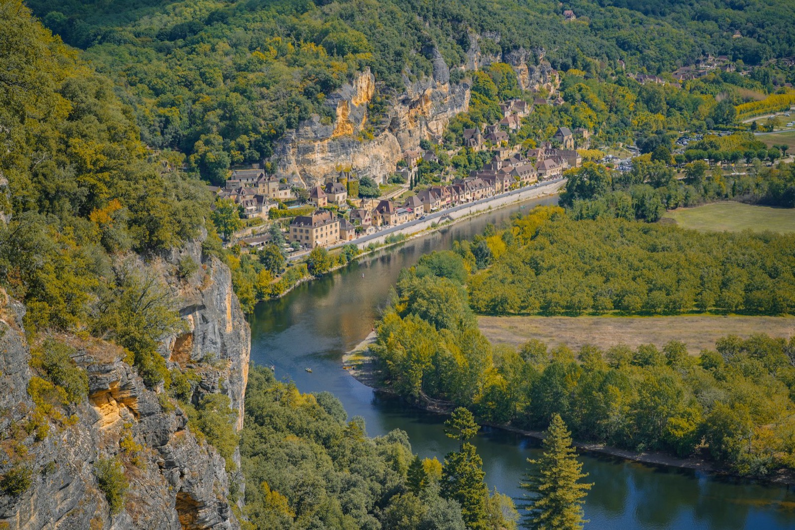 A river valley and stone village in southwest France