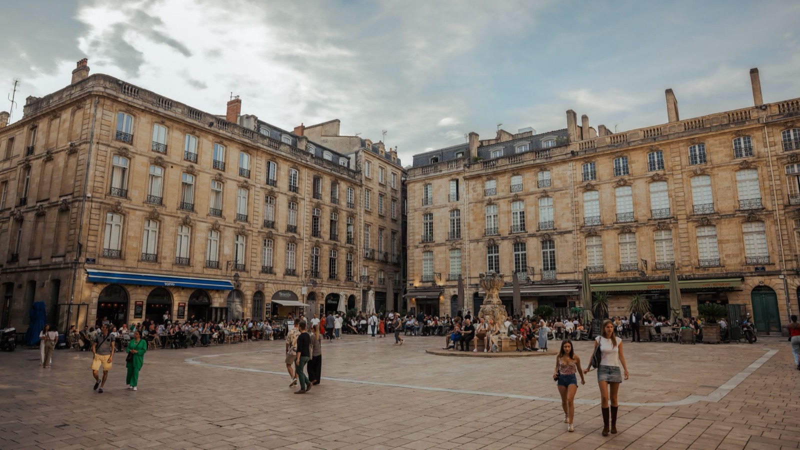 A French village square with marked parking spaces