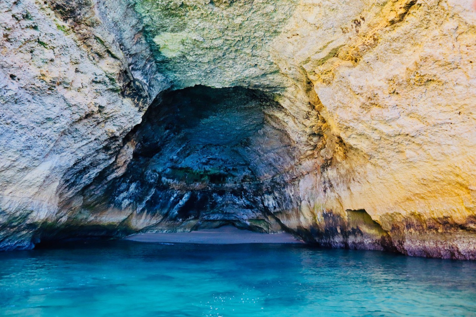 Sandstone cliffs and a sheltered beach on the Algarve coast