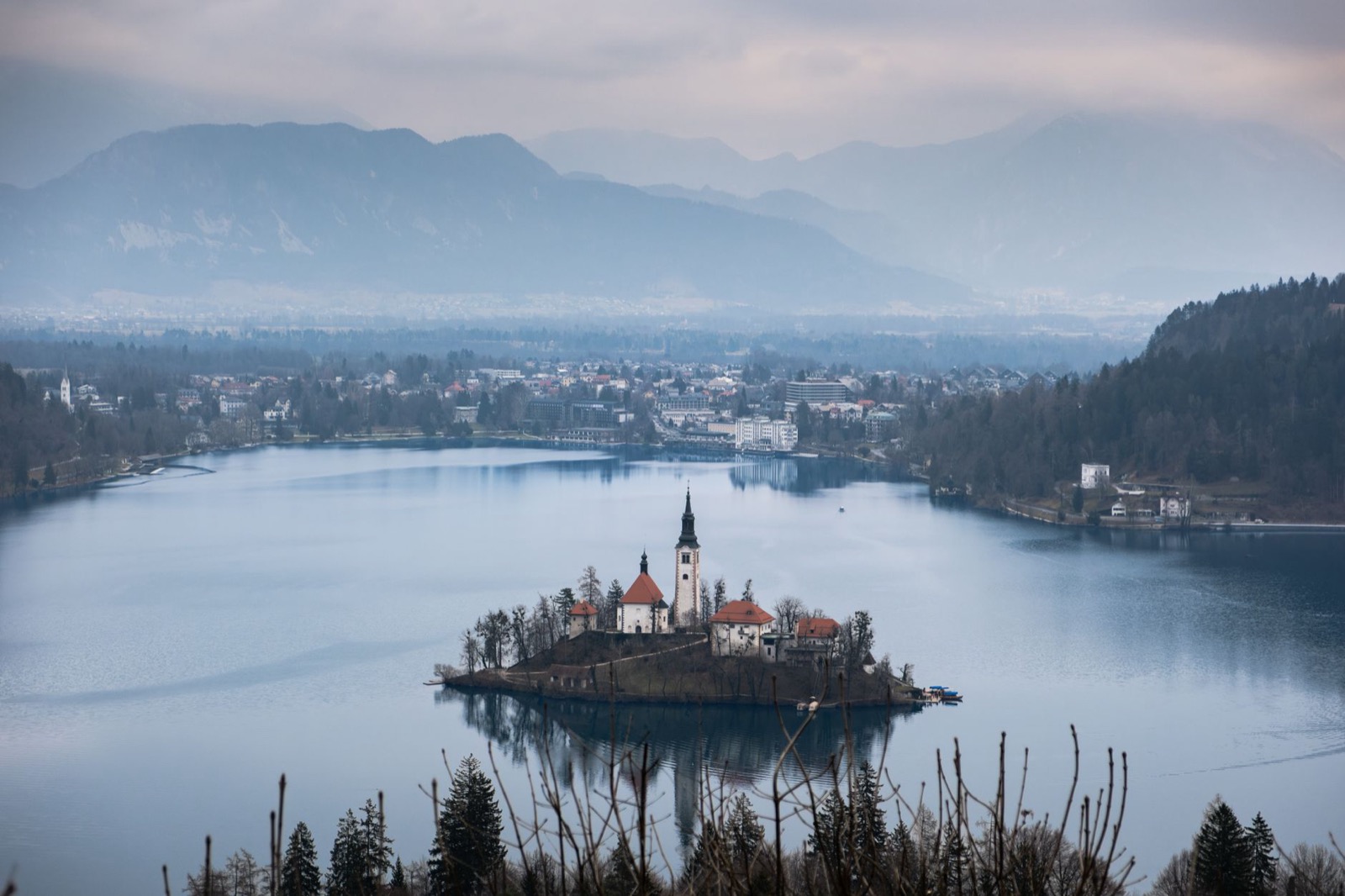 The island church on Lake Bled with the Julian Alps rising behind it in morning light